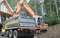 Excavator loading a dumptruck